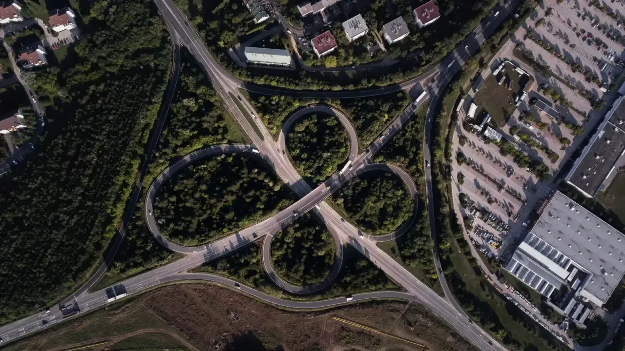 An aerial view of a motorway cloverleaf interchange near Veszprém, Hungary
